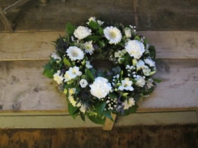 Wreath - A traditional wreath arranged in your choice of colours.